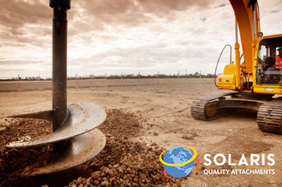 close up view of auger digging into ground