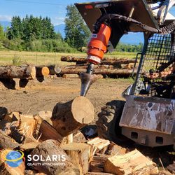 cone splitter on excavator actively splitting a log